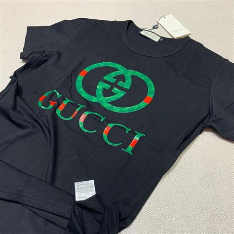 maglietta gucci sul letto|maglioni gucci donna.